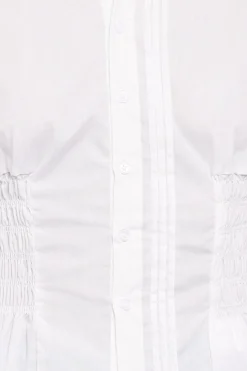 Ione Peplum Shirt